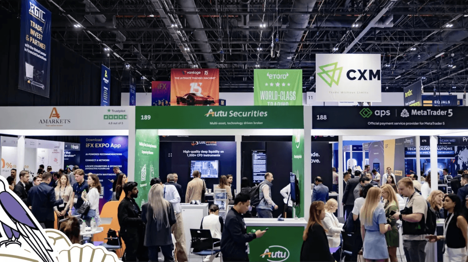 Attendees at the iFX EXPO Dubai 2026 exhibition floor with branded booths and the iFX EXPO App on display